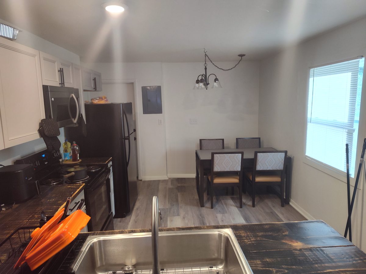 Shared kitchen and dining area in a Tina Marie's men's sober living home in the Dayton, Ohio area